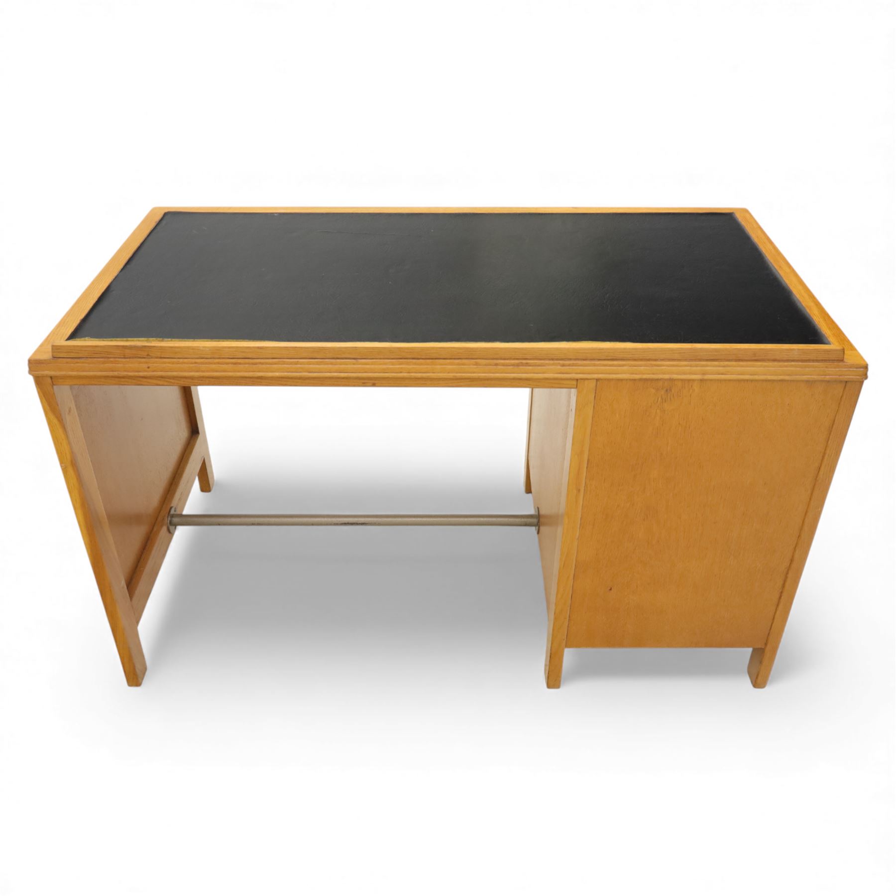 Gordon Russell - Oak pedestal desk with black leather inset top, rectangular galleried back, five graduating drawers, tubular metal handles and stretcher on square supports