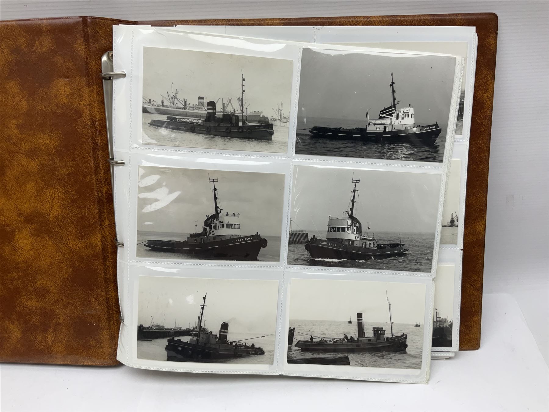 Collection of loose Edwardian and later postcards, mostly topographical examples depicting East Yorkshire, Hull and the East Coast, including Hull, Bridlington, Staithes, Flamborough Head, Beverley, etc., and a quantity of other postcards, plus two photograph albums containing photographs of trawlers