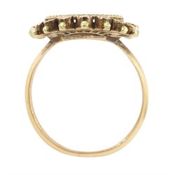 19th century 18ct gold portrait ring, set with an octagonal miniature of a woman wearing a pink dress on ivory, under a glazed panel, within a milled bezel and garnet surround, surmounted by a coronet set with seed pearls and further garnets. This lot has been registered for sale under Section 10 of the APHA Ivory Act