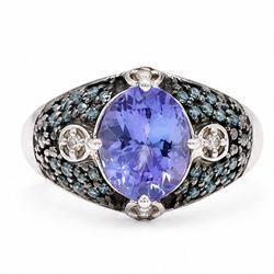 9ct white gold tanzanite and diamond ring, single oval cut tanzanite of approx 1.70 carat,...