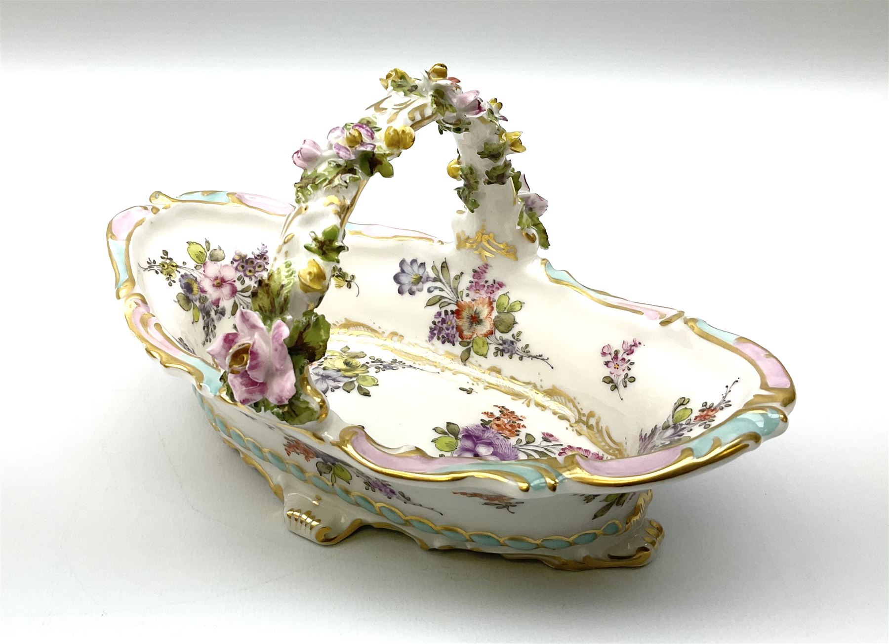 Dresden floral basket, hand painted with floral decoration and gilt scrolls, H12cm, L20cm. 