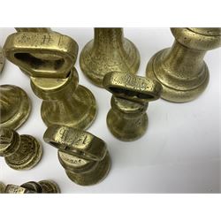 Set of seventeen Victorian brass bell weights