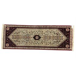 Persian Abadeh indigo ground runner rug, ivory field with pole medallion surrounded by plant and bird motifs and contrasting spandrels, border with interlaced flowerheads