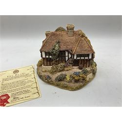 Nine Lilliput Lane cottages from the British and English collections to include Crown Inn, Wealden House, Puffin Row, etc, all boxed, one without deeds