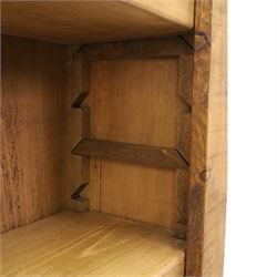 Indigo Furniture - large rustic oak open bookcase, with four adjustable shelves, above a plinth base 