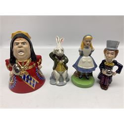Thirteen Wade Collectors Club figures, comprising six Alice in Wonderland figures; Queen of Hearts, Alice, Mad Hatter, The Doormouse, White Rabbit and Cheshire cat, six Cinderella figures; Fairy Godmother, Cinderella Ready for the Ball, Prince Charming, Cinderella, Clorinda and Thisbe, together with Beauty from Beauty and the Beast, all with original boxes  