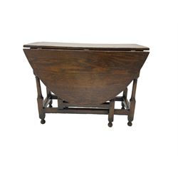 19th century country oak drop leaf dining table, oval top over turned gate-leg supports united by stretchers
