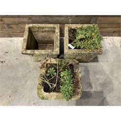 Pair of cast stone pattern tapering square planters, and a similar planter (3)