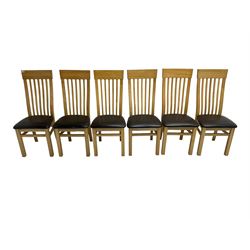 Contemporary light oak dining table, rectangular top on square supports (W161cm D91cm H78cm);set of six light oak dining chairs, high slatted backs over black vinyl seats (W46cm H106cm)