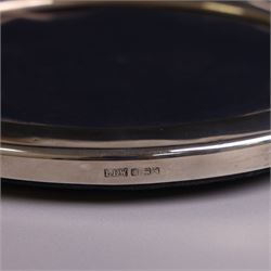 Four late 20th century silver mounted photograph frames, comprising two oval frames and pair of smaller circular frames, all hallmarked Laurence R Watson & Co, Sheffield 1983/4, largest H16.5cm