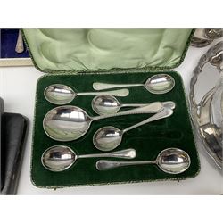 Silver plate oval twin handled tray, with chased and engraved decoration and upon four claw feet, by Viners Ltd, together with other silver plate and metal ware, including coffee set, fruit serves, butter knives, etc