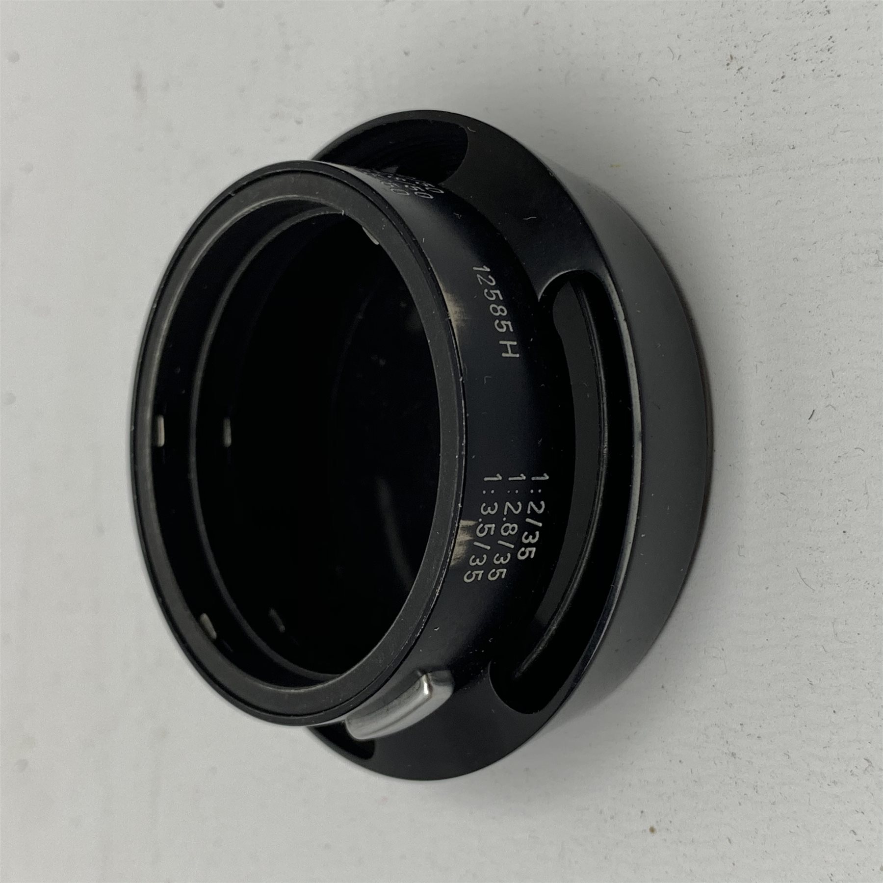 Leica M2-1013180 camera fitted with Leica Summicron 1:2/50 Leitz Wetzlar lens (1764800) and UVa filter, and Leica-Meter MR in leather case together with; Leica Elmarit 1:2.8/90 LW lens (1805634), Leica Summaron 1:28/35 LW lens (1782507), Leica M3 M2 adapter ring, Leica filters yellow and orange cased, three Leica lens hoods IUFOO, IROOA and 12585H (boxed), Leica pocket book, guide and 1960s survey catalogue & price guide leaflet, with original M2 camera box