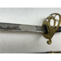 Replica Confederate States Army officer's sword, with brass pommel, black leather hand grip, the 85cm single edged blade marked CSA, in a metal and brass scabbard, L106cm