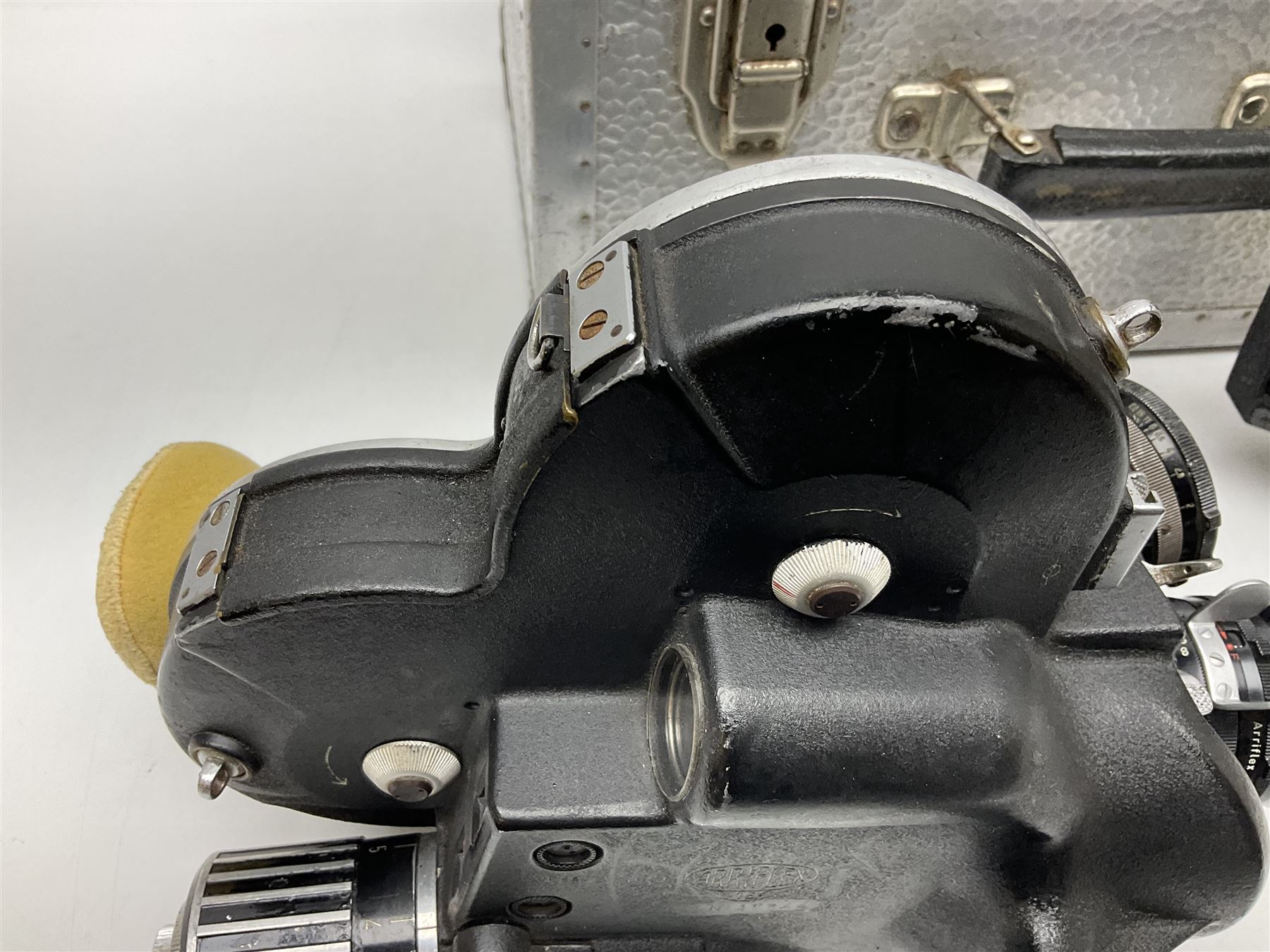 Arriflex 16SB camera body, serial no. 1784, with ' Carl Zeiss Distagon 1:2 f=8mm' lens, serial number 3860224, 'Carl Zeiss Jean Tessar 2/16' lens, serial no 3624355, camera pistol grip and other accessories, in fitted hard case