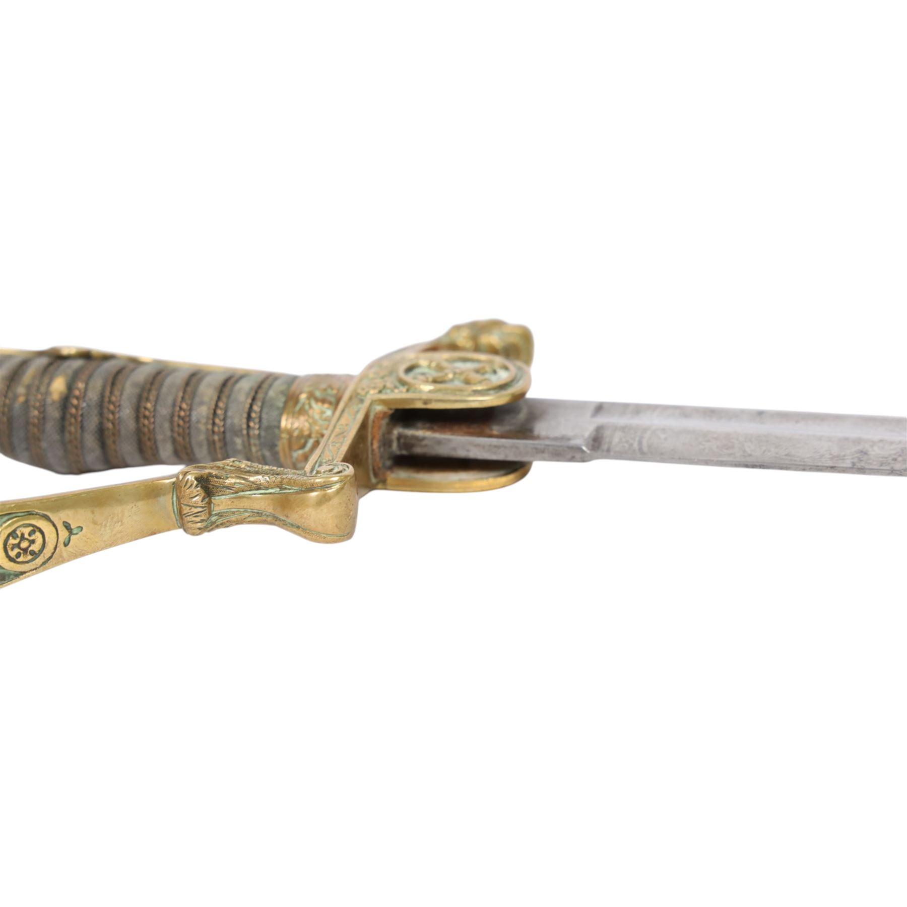 WWI Prussian Artillery Officer's dress sword, with 83cm single edge fullered steel blade, brass stirrup hilt, the langet with crossed cannon barrels and a vacant shield cartouche, the curved knuckle bow cast with acorns and oak leaves, wire bound grip and lion head pommel, with steel scabbard, overall L100cm