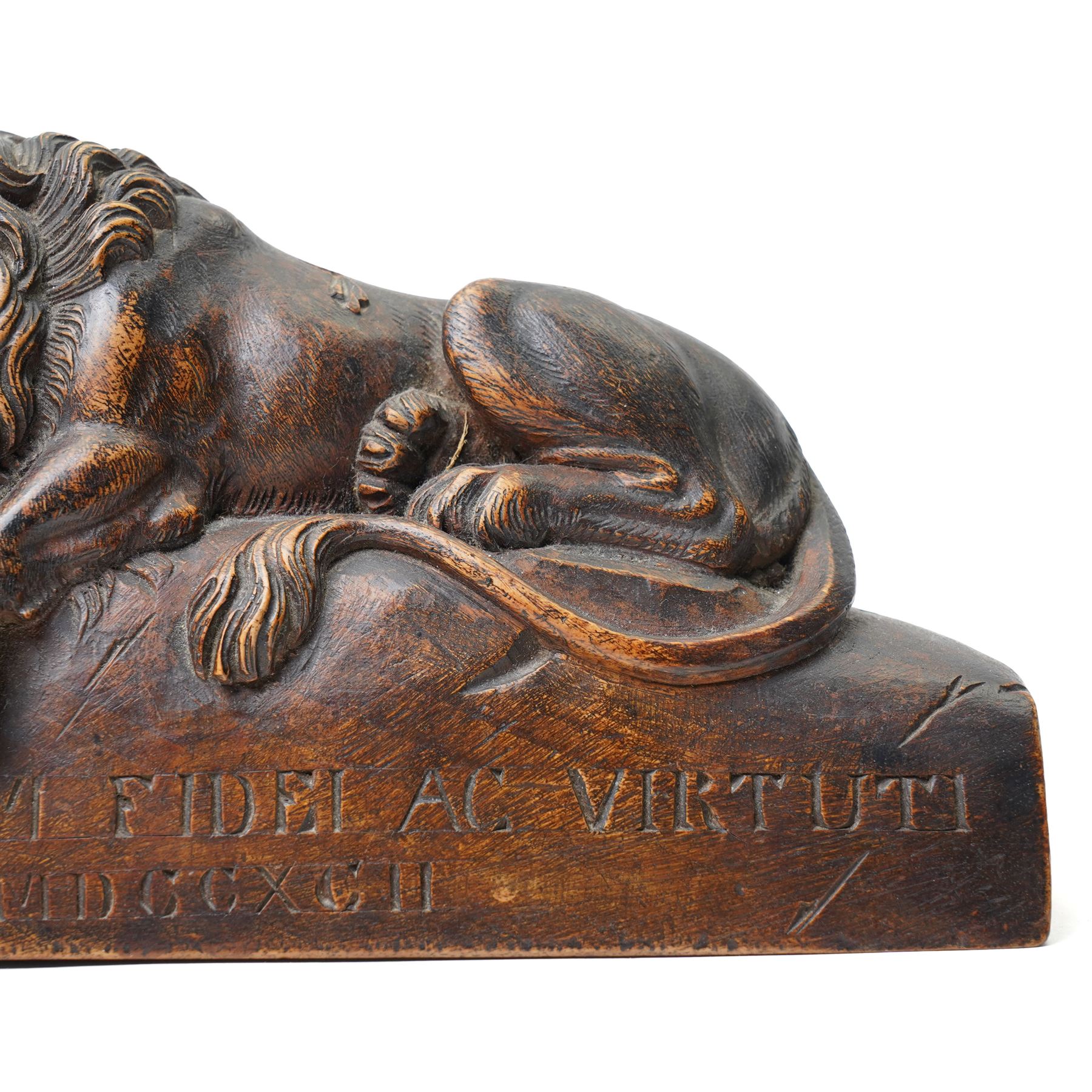 After Bertel Thorvaldsen (Danish 1770-1844): 'The Lion of Lucerne', 19th century walnut carving after the Swiss stone monument, commemorating the Swiss Guards who were killed in 1792 during the French Revolution, H14cm W27cm
