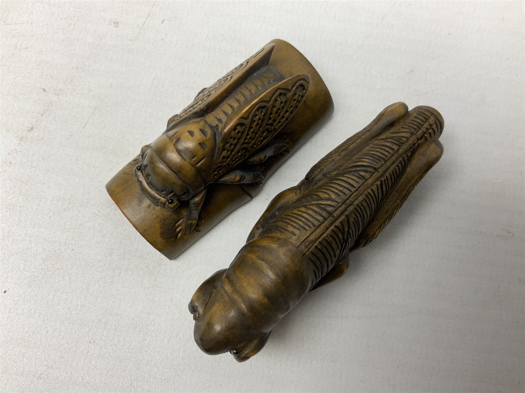Six netsuke, modelled as a lizard, cricket, frog, bird on a flower, turtle and insect
