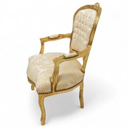 French design gold painted framed armchair, serpentine front with cream damask upholstery, padded arms with studded border  
