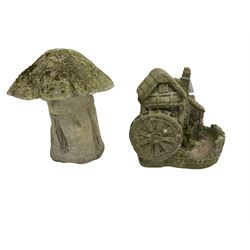 Composite stone garden ornament in the form of a mushroom together with another similar of a windmill (2)