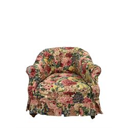 Victorian low tub shaped armchair, beech framed with compressed bun feet, loose floral fabric
