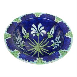 After Torquato Castellani, tin-glazed earthenware bowl, with a floral design the the centre, marked beneath, D19cm 