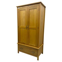 Light oak double wardrobe, hanging rail with single drawer on square legs 