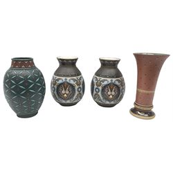 Four 19th Century Mettlach vases, comprising pair of bulbous vases, stylistically moulded with foliate scrolls, beaded borders with gilt highlights,  vase of ovoid form with taper neck, incised decoration of floral springs and flower heads in brown and turquoise on deep blue ground, and flared rim vase, the blue and terracotta ground with pale blue jewelled decoration, all with impressed makers mark beneath, tallest vase H26.5cm. 