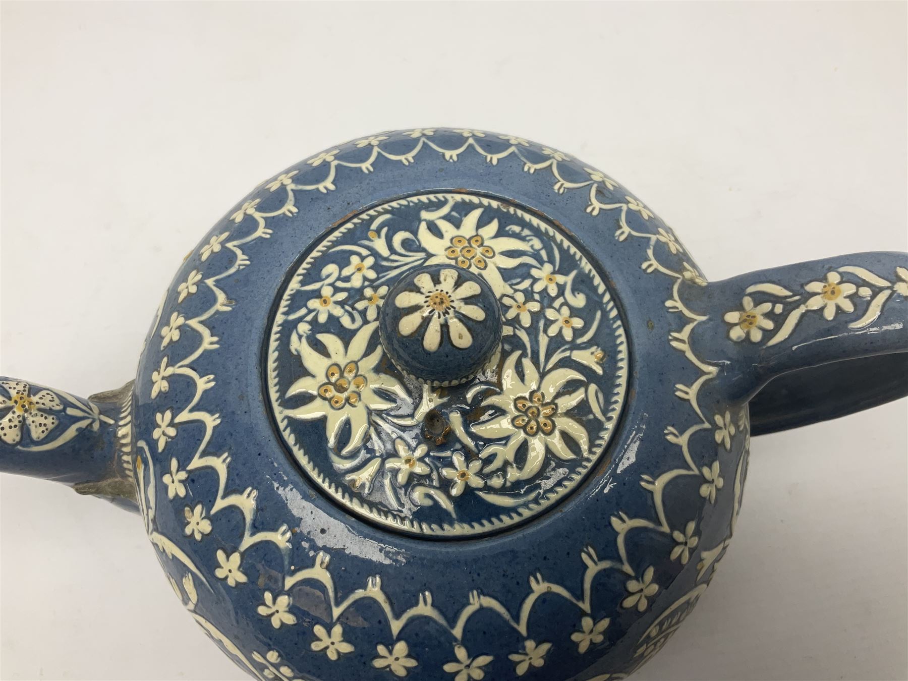 Swiss Thun pottery teapot and cover, decorated with edelweiss flowers, H16cm