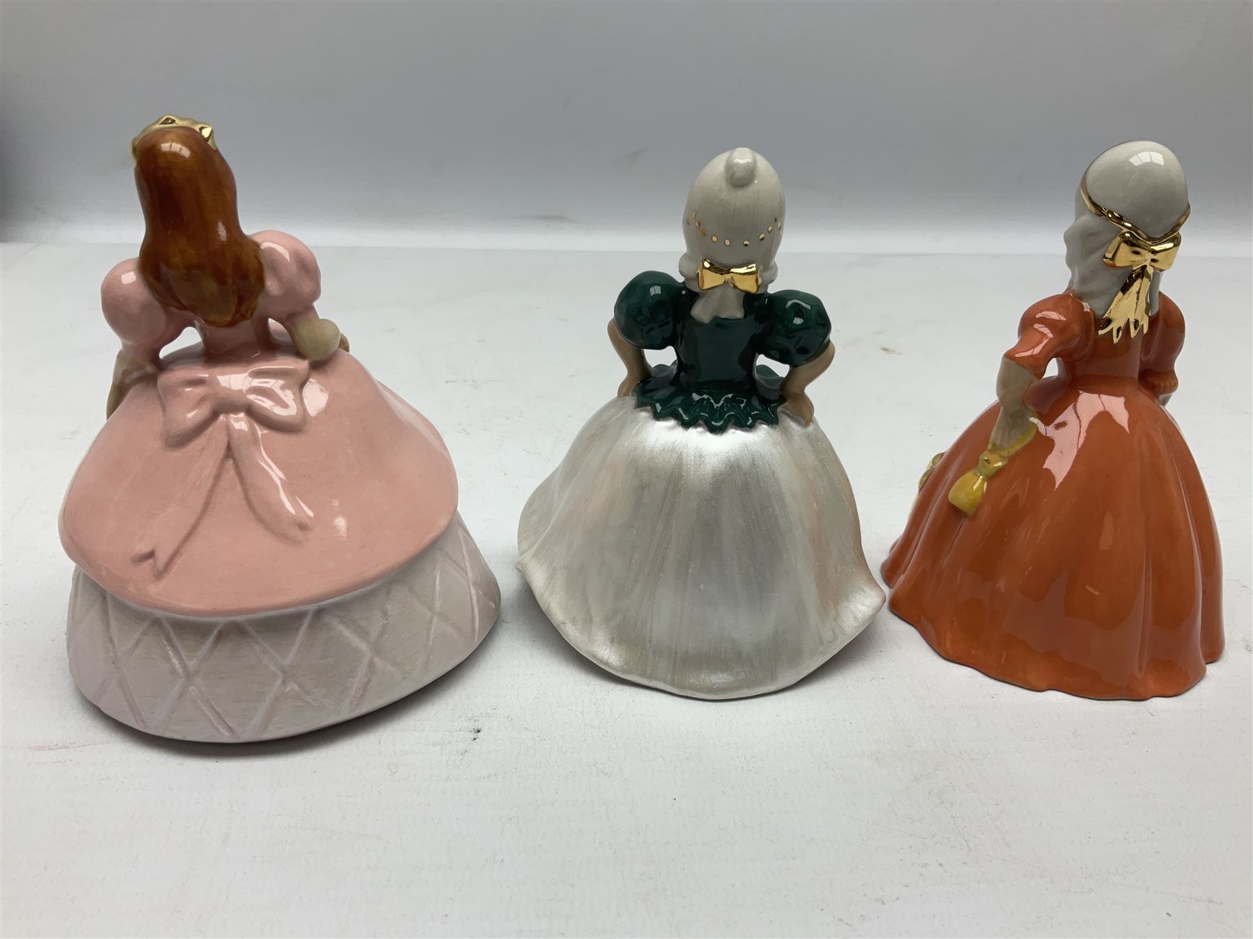 Thirteen Wade Collectors Club figures, comprising six Alice in Wonderland figures; Queen of Hearts, Alice, Mad Hatter, The Doormouse, White Rabbit and Cheshire cat, six Cinderella figures; Fairy Godmother, Cinderella Ready for the Ball, Prince Charming, Cinderella, Clorinda and Thisbe, together with Beauty from Beauty and the Beast, all with original boxes  