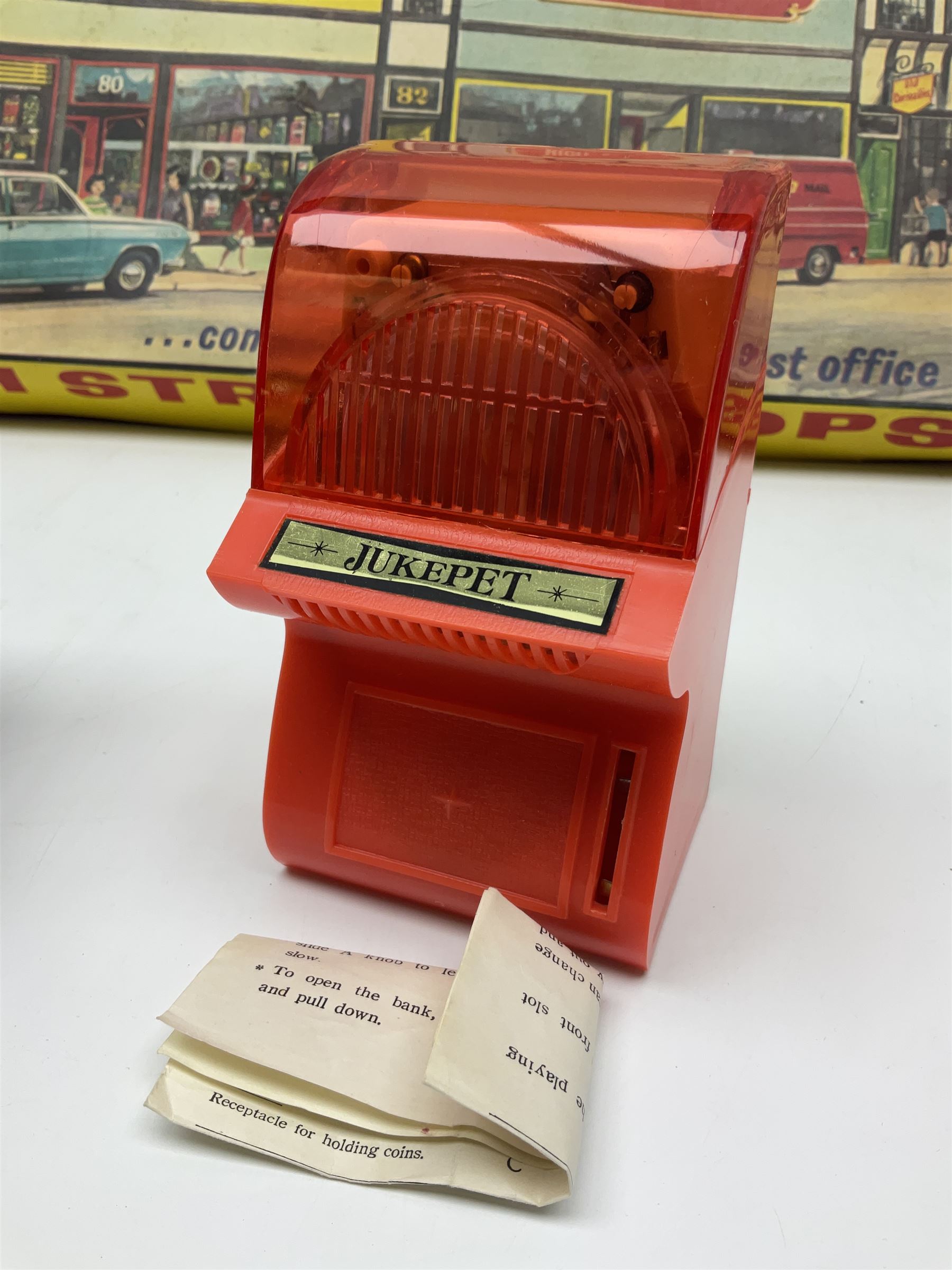 Berwick Toys High Street Shops layout with well-stocked sweet shop and post office; H.C.F. Build A Farm set; and Jukepet battery operated miniature jukebox; all boxed (3)