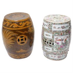 Chinese famille rose garden seat, together with a further terracotta example, H51cm and 49cm (2)