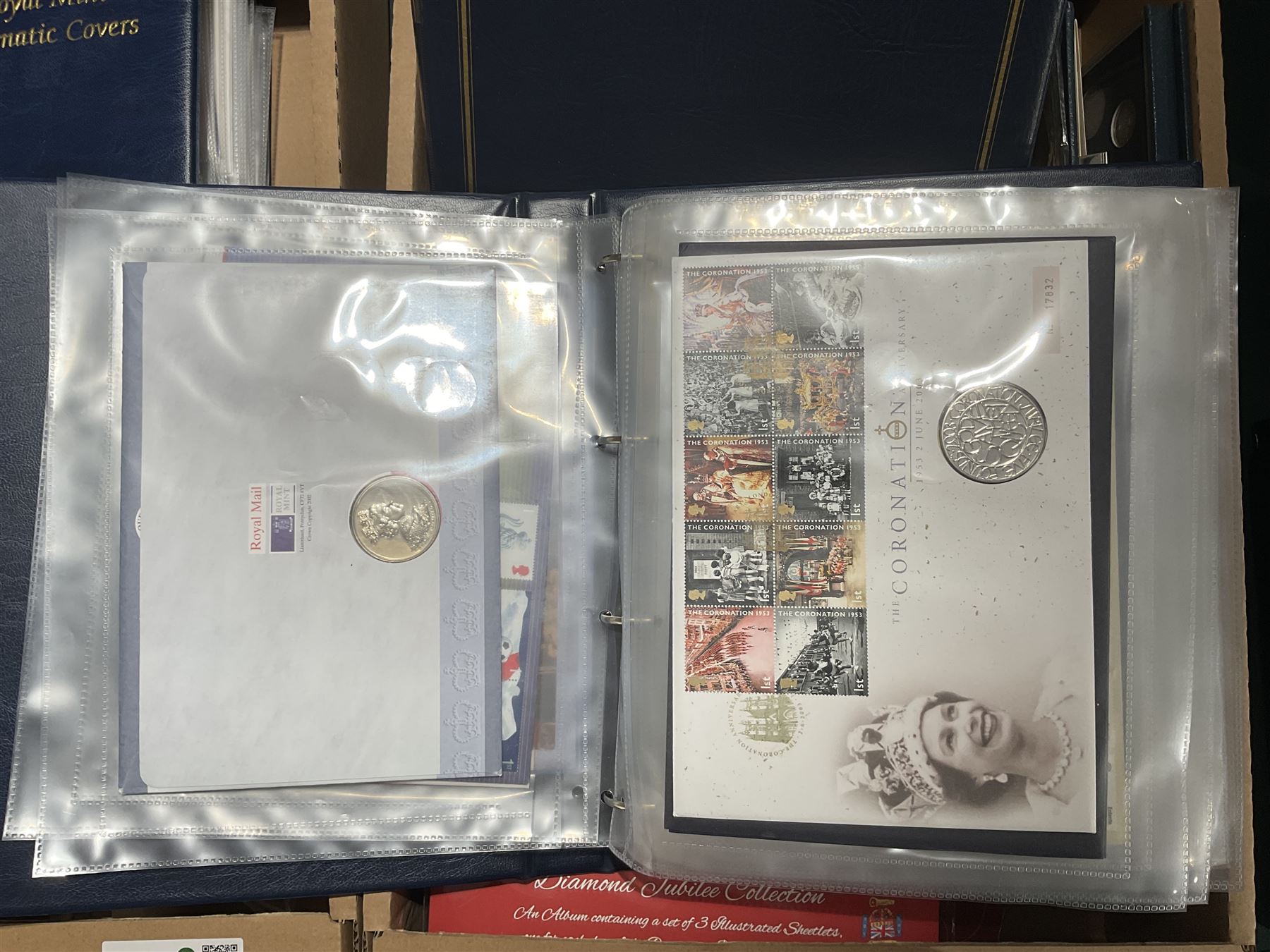 Approximately one hundred and fifteen Royal Mint coin covers, in two ring binder folders and loose, together with approximately 53 grams of Great British pre-1920 and approximately 68 grams of Great British pre-1947 silver threepence coins, and a small quantity of further pre-decimal coins
