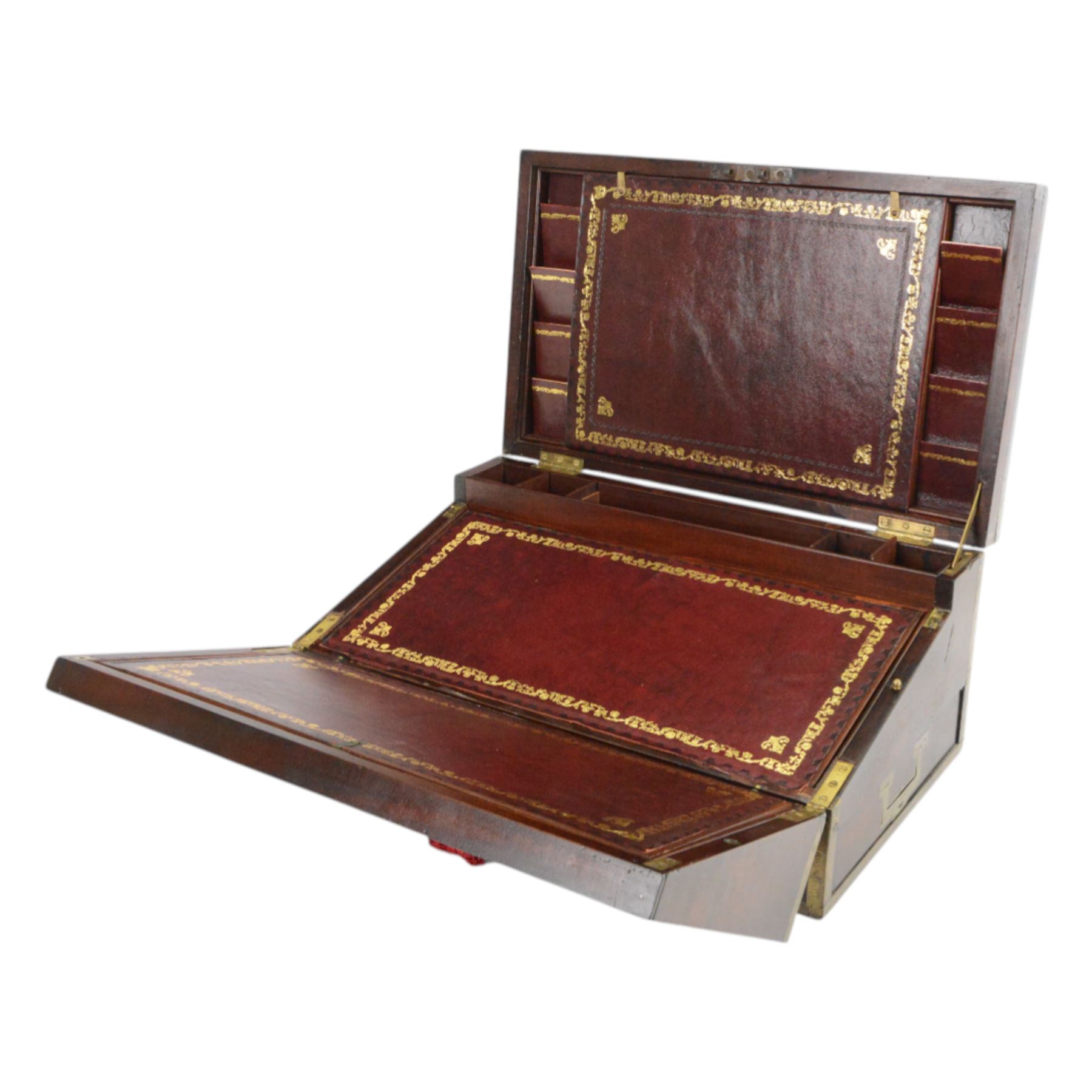19th century brass bound mahogany writing slope with twin drop carry handles to sides, the hinged cover opening to reveal a  gilt tooled burgundy leather slope and compartmented interior, H22xm W50.5cm D30cm