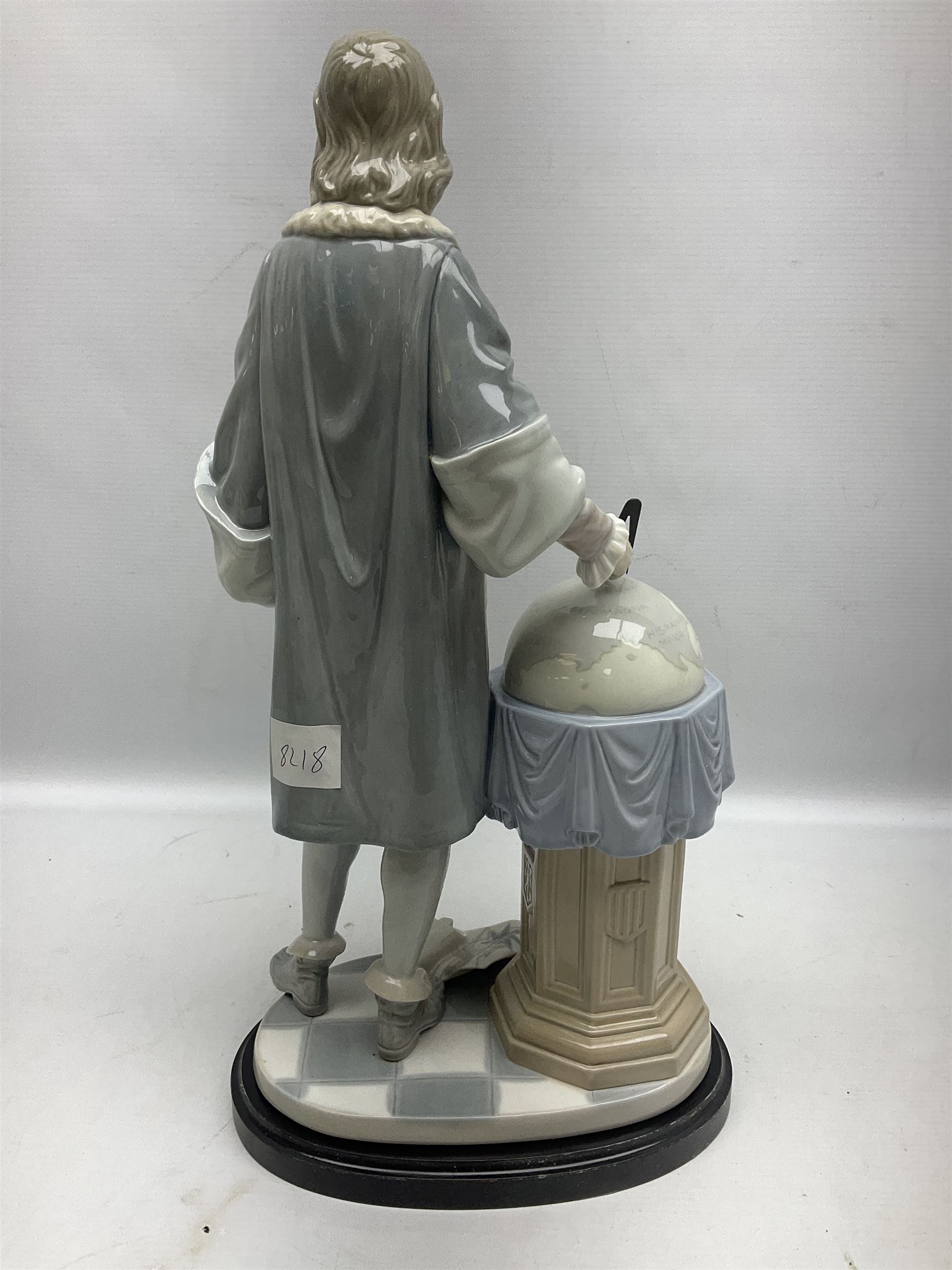 Lladro figure, Columbus, modelled as Christopher Columbus stood by a globe, limited edition 896/1200, no 1432, sculpted by Salvador Furio, with original box, year issued 1982, year retired 1988, H42cm