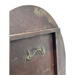 George III mahogany breakfast table, the oval top with a kingwood band and boxwood stringing, raised on a turned vasiform pedestal terminating in a fluted sabre tripod base with hairy paw feet and castors