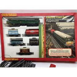 '00' gauge - Hornby Freightmaster train set with Class 31 A1A-A1A diesel locomotive No.D5572; Tri-ang RS24 train set (lacking locomotive); both boxed; three unboxed locomotives (one for spares or repair); four wagons; and quantity of track