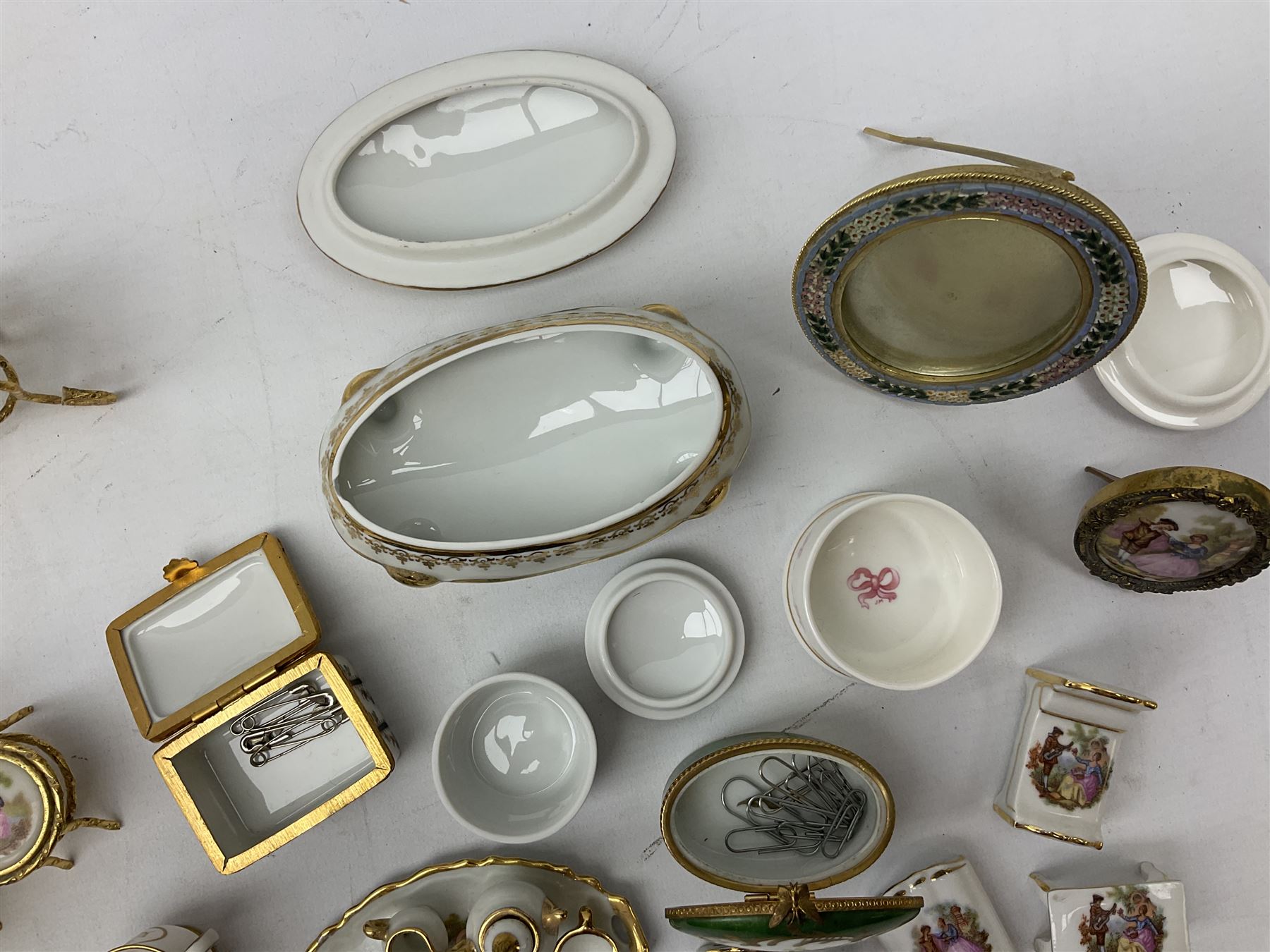 Limoges La Reine miniature furniture to include two chairs and table set, wardrobe etc, Limoges lidded boxes to include Bernadaud example, Limoges miniature tea service on tray, other boxes and miniatures to include Spode twin handled loving cup etc