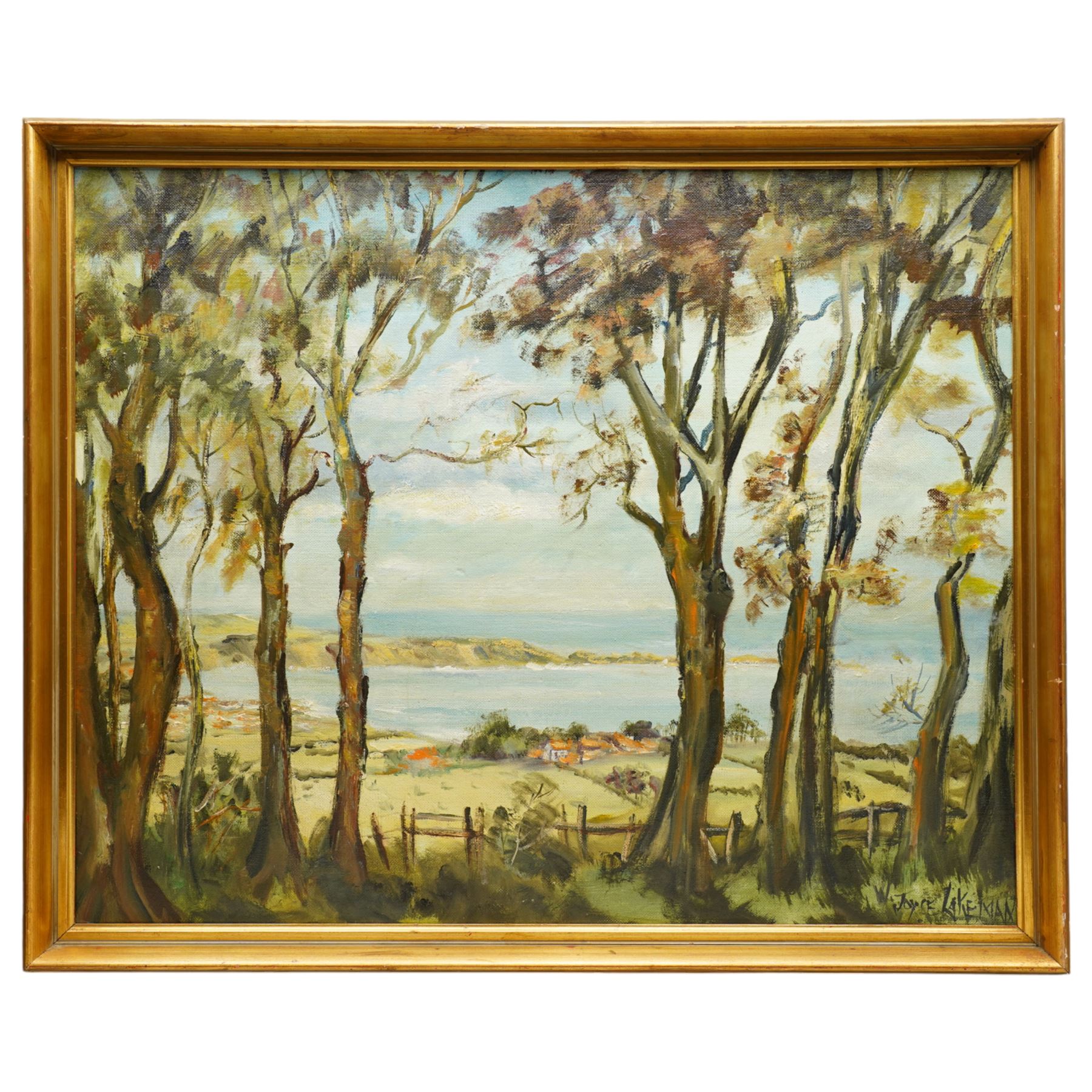 W Joyce Lakeman (British 20th century): Coastal Tree Landscape, oil on board signed 58cm x 72cm