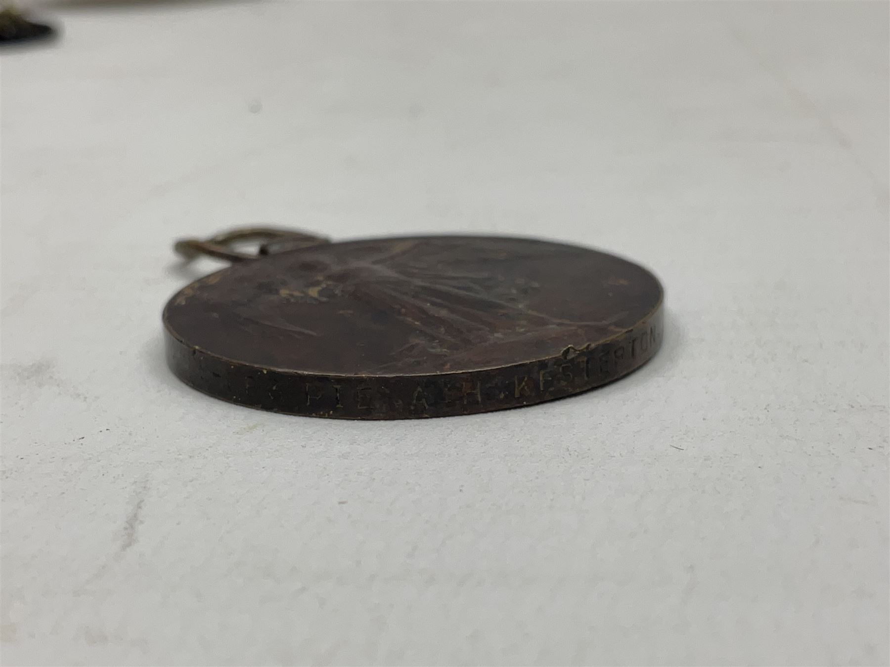 Two silver Georgian tablespoons, approximate total weight 3.36 ozt (104.7 grams), together with Great War Peace Medal 1919 and two others 