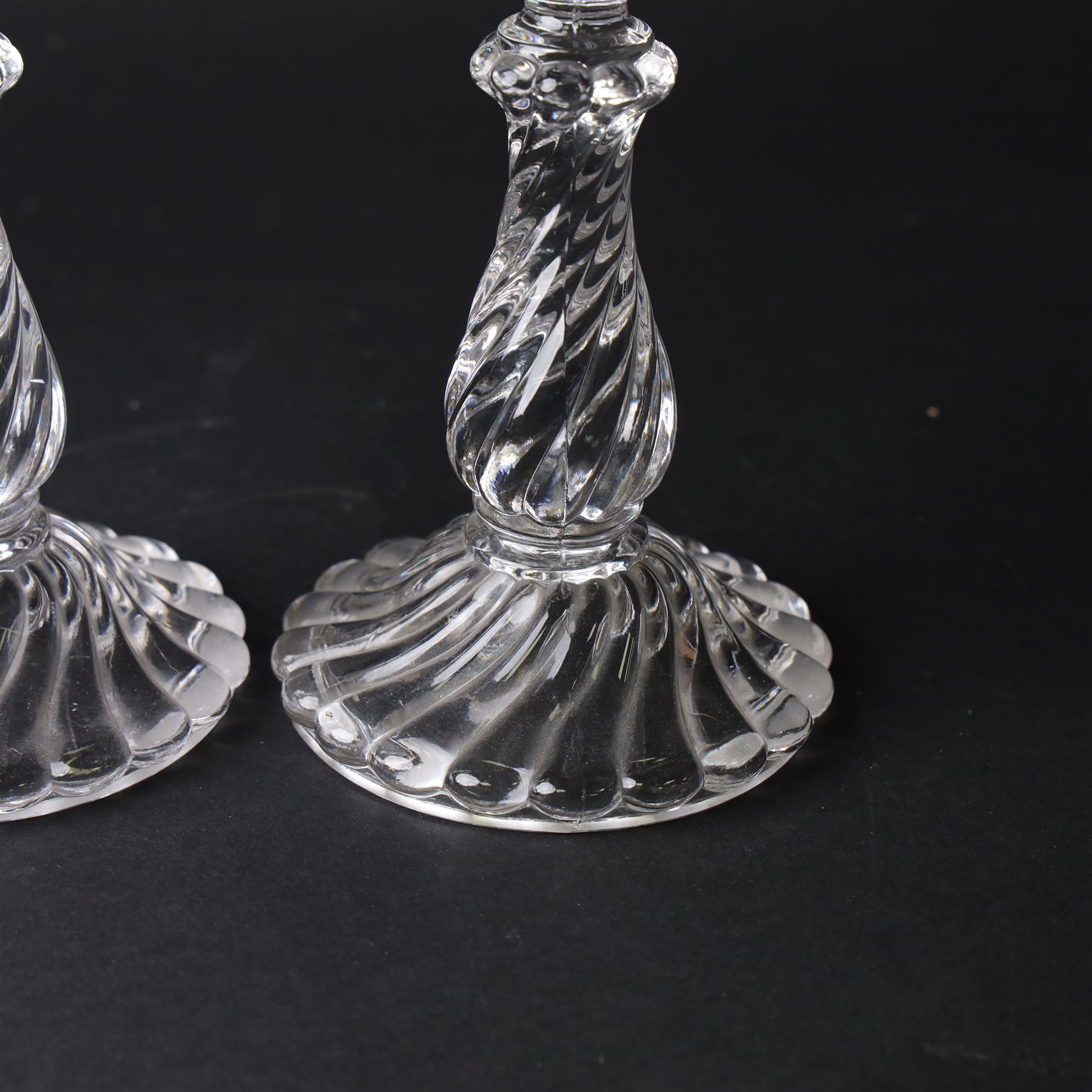 Pair of Baccarat Bambous glass candlesticks, with wrythen moulding, marked beneath, H19cm