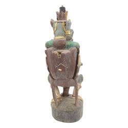 Hindu wooded sculpture depicting Vishnu riding on the shoulders of Garuda, H80cm