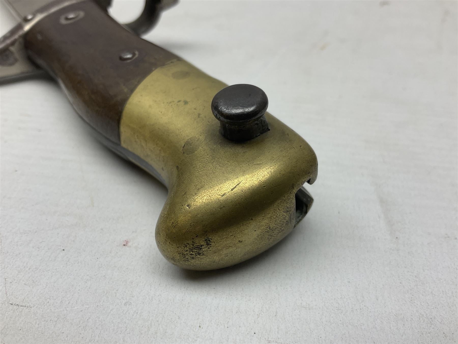 French Model 1866 Chassepot bayonet with 57cm curving fullered steel blade dated 1873 No.L63963; in steel scabbard with conforming number L71.5cm overall; and French St. Etienne Gras bayonet dated 1878 No.K10674 in steel scabbard numbered 79437 (2)