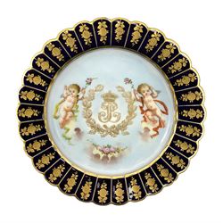 Mid 19th century Sevres Louis Philippe period porcelain cabinet plate, decorated with central Louis Philippe crowned monogram flanked by two cherubs, within cobalt gilt detailed border, with date mark for 1846, red inventory mark for Chateau des Tuileries, and blue monogram mark , D14.5cm