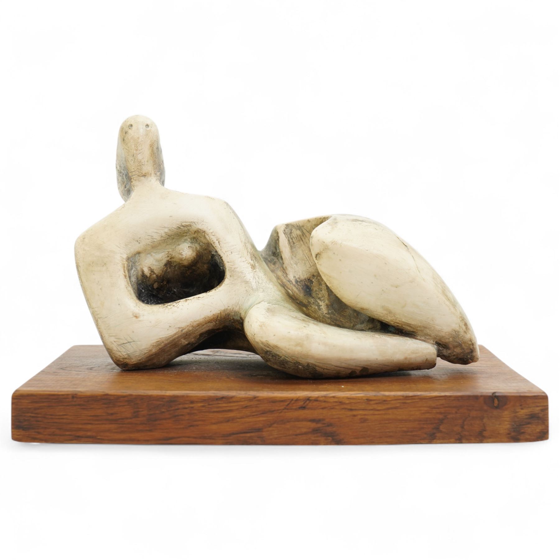 After Henry Moore (British 1898-1986): 'Reclining Figure Curved', terracotta maquette sculpture, base marked with affixed catalogue label inscribed 'Reclining Figure: Curved: 1976 Archive 0070930', W25cm H16cm