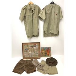 Mid 20th century Boy Scouts uniform, comprising corduroy shorts, further pair of shorts, two shirts, socks, and felt hat, together a framed collection of Ogden's 'Boy Scots' cigarette cards, and an unframed print of Lord Baden Powell. 