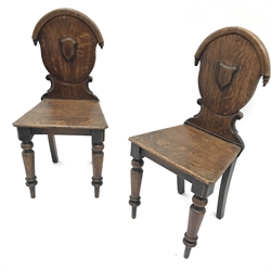 Pair Victorian oak hall chairs, carved back, solid seat, turned supports, W44cm