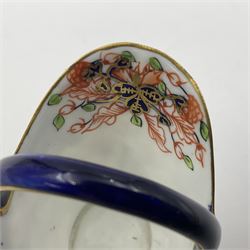 Group of Crown Derby and Royal Crown Derby Imari pattern miniatures, including mid 19th century Stevenson and Hancock cauldron, with painted mark beneath, H5.5cm, a near pair of early Royal Crown Derby scuttles, decorated in the 6299 pattern, each with printed and painted marks beneath including illustration date codes for 1913 and 1922, tallest 6.5cm, and a further early 20th century Royal Crown Derby scuttle, decorated in the 6299 pattern, with printed and painted marks beneath including illustration date code for 1922, H5.5cm, (4)
