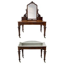 Victorian figured mahogany two-piece bedroom set - the washstand with white and black marble moulded top with arched back and raised shelf, two moulded frieze drawers, on turned and fluted supports with brass and ceramic castors (W123cm, D60cm, H102cm); the dressing table with raised swing mirror in moulded frame with shell and scroll carved pediment, on scrolled horns carved with foliage, four raised trinket drawers over moulded rectangular top, fitted with two drawers, on turned and fluted supports with brass and ceramic castors (W122cm, H177cm, D62cm)