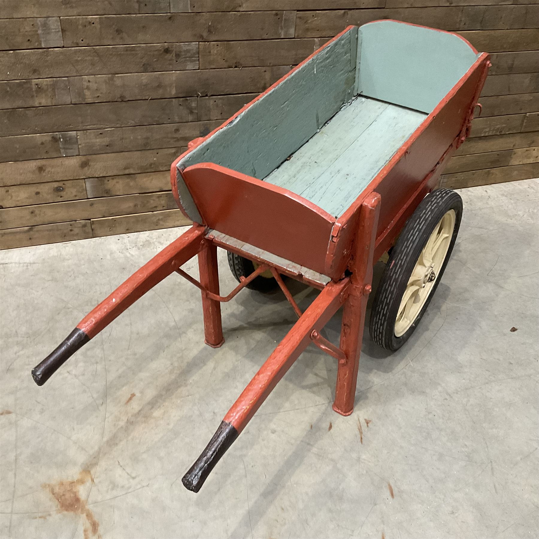 Painted timber hand cart on cast iron wheels