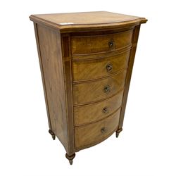 Frank Hudson - mid-20th century Mindi ash and burr walnut bow-fronted lingerie chest, crossbanded hinged top concealing vanity mirror, over five graduated cockbeaded drawers, raised on turned supports